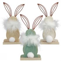 Article Lapin décoratif lapins en bois avec plumes décoration de Pâques H17,5cm 3pcs