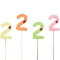Article Bouchons numérotés anniversaire 2 bouchons fleurs bois 27,5cm 16 pcs