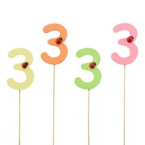Article Bouchons numérotés anniversaire 3 bouchons fleurs bois 27,5 cm 16 pcs