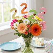 Article Bouchons numérotés anniversaire 2 bouchons fleurs bois 27,5cm 16 pcs