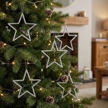 Article Set de 12 étoiles suspendues argentées avec paillettes 12cm pour décoration de Noël