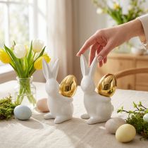 Article Lapins avec oeuf d'or, lapins en céramique pour Pâques blanc noble, doré H13cm 2pcs
