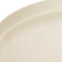 Article Plateau décoratif rond couleur crème, 30 cm, sur un support pour la décoration de table
