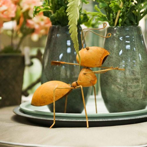 Article Figurine décorative fourmi en métal avec râteau décoration de jardin rouille 21,5cm