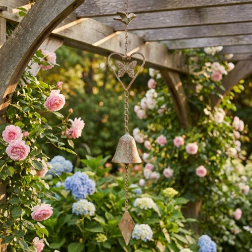 Article Carillon à vent en métal avec cœur et cloche décoration de jardin antique 72cm