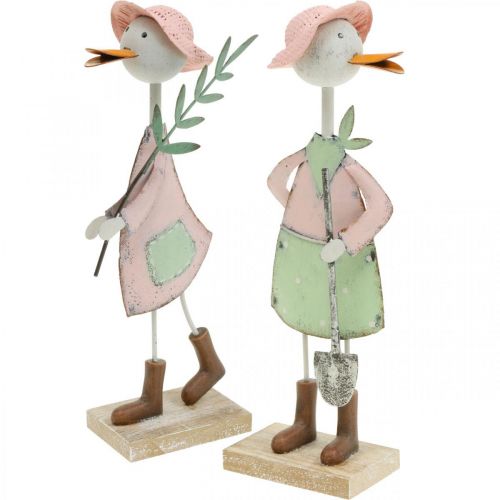 Floristik24 Cigogne avec pelle, oiseau métal avec branche, oiseau déco, figurine jardin, décoration métal H26/28cm lot de 2