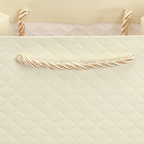 Article Sac cadeau sac cadeau en papier crème 18×10×23cm 1 pièce
