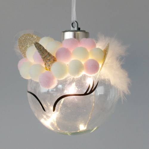 Article Boule de sapin de Noël licorne avec chaîne lumineuse LED couleurs bonbon, verre transparent, pompon Ø8cm Pour piles