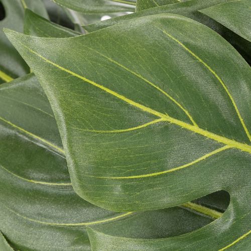 Article Monstera artificielle à grand feuillage pour une touche d'élégance dans votre salon (120 cm).