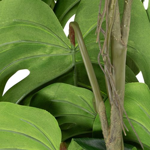 Article Monstera artificielle à grand feuillage pour une touche d'élégance dans votre salon (120 cm).