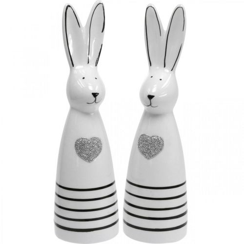 Floristik24 Lapin en céramique noir et blanc, décoration lapin de Pâques paire de lapins avec coeur H20,5cm 2pcs