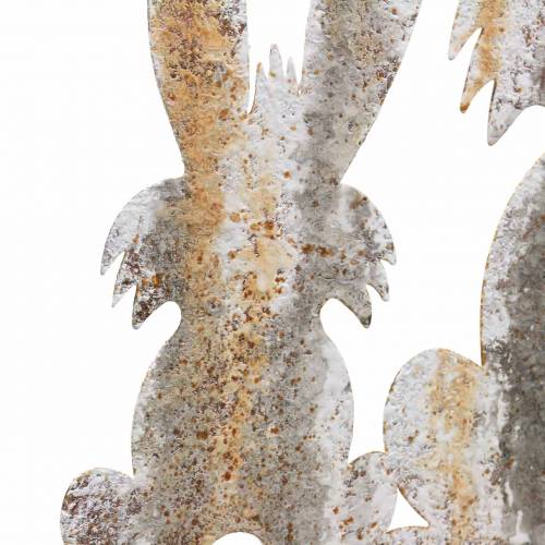 Article Décoration de Pâques lapin avec enfant à coller rouille aspect bouleau métal 25×32cm