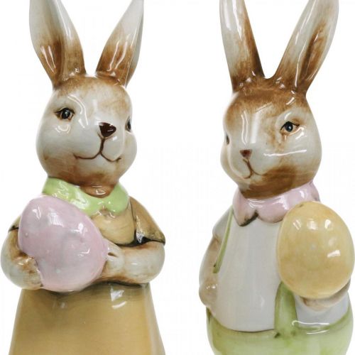 Floristik24 Déco lapin de Pâques avec oeuf, décoration de Pâques couple de lapins, céramique, H24cm 2pcs