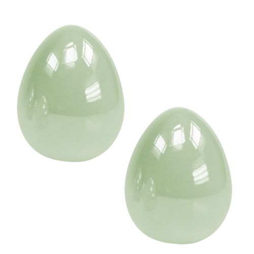 Floristik24 Oeuf en céramique debout vert pastel 8.5cm 4pcs
