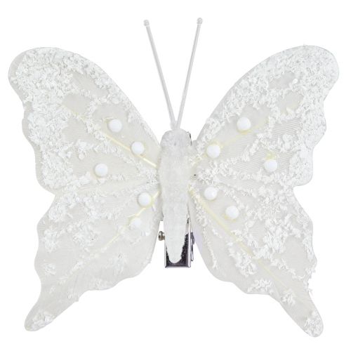 Article Décoration papillon en blanc sur pince 7,5cmx7cm 4 pièces