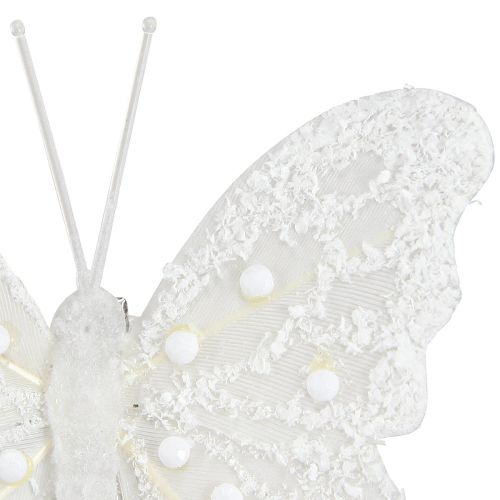Article Décoration papillon en blanc sur pince 7,5cmx7cm 4 pièces