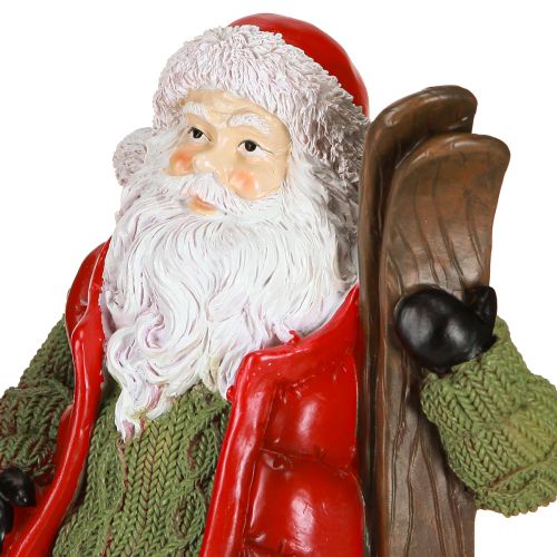 Article Figurine décorative du Père Noël avec ski peinte 14 × 10,5 × 24,5 cm