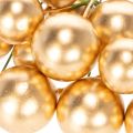 Boules artificielles dorées
