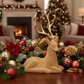 Figurine décorative représentant un cerf couché avec des bois, décor floqué, 58 cm | Floristik24.be