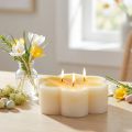 Bougie trois mèches bougie fleur décorative jaune blanc Ø11,5cm H4cm | Floristik24.be