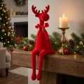 Figurine décorative d'élan avec nœud, assis, floqué, à poser sur une étagère, 54 cm | Floristik24.be