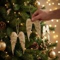 Set de 4 décorations suspendues ailes d'ange dorées en métal 14,5×9 cm | Floristik24.be