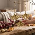 Lot de 12 décorations feuilles de ginkgo en métal doré avec cordelette L12cm | Floristik24.be