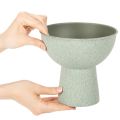 Pot de fleurs rond moderne sur